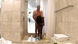 Sexy Black Milf takes a hot steamy shower with white sugar daddy at his penthouse